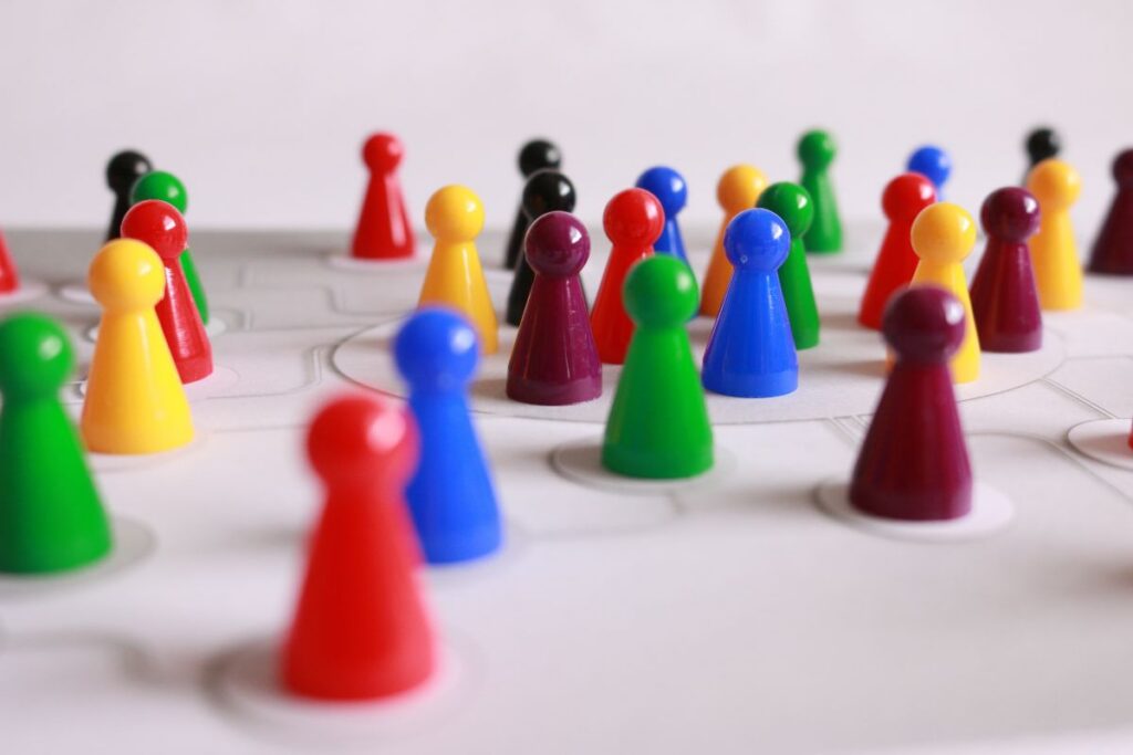 Colourful pins representing stakeholders involved in a corporate action
